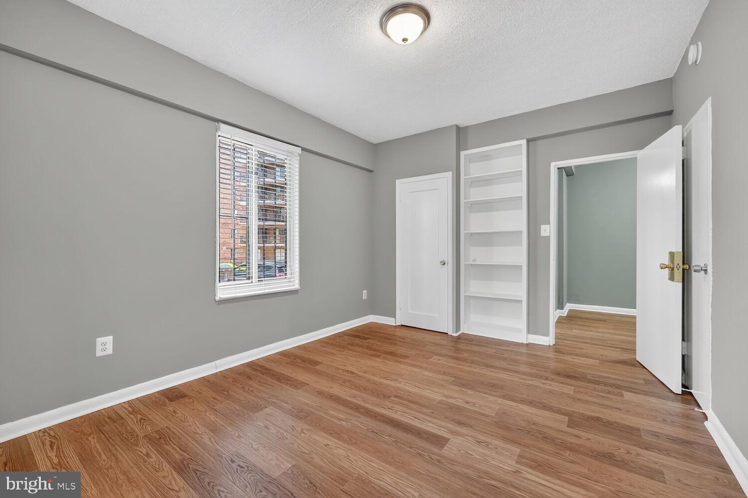 1727 Massachusetts Avenue Northwest, Unit 119 Washington, DC 20036 - Photo 11 of 16 Bedroom w/2 closets + built-ins