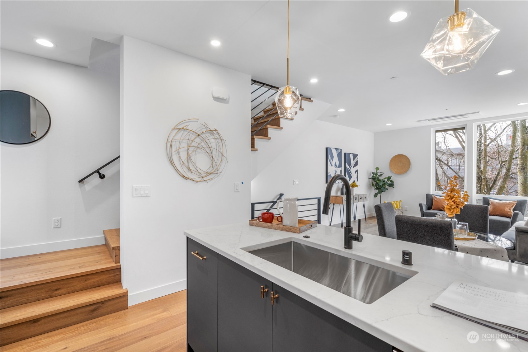 6014 B California Avenue Southwest Seattle, WA 98136 - Photo 16 of 27 a kitchen with furniture and a large window