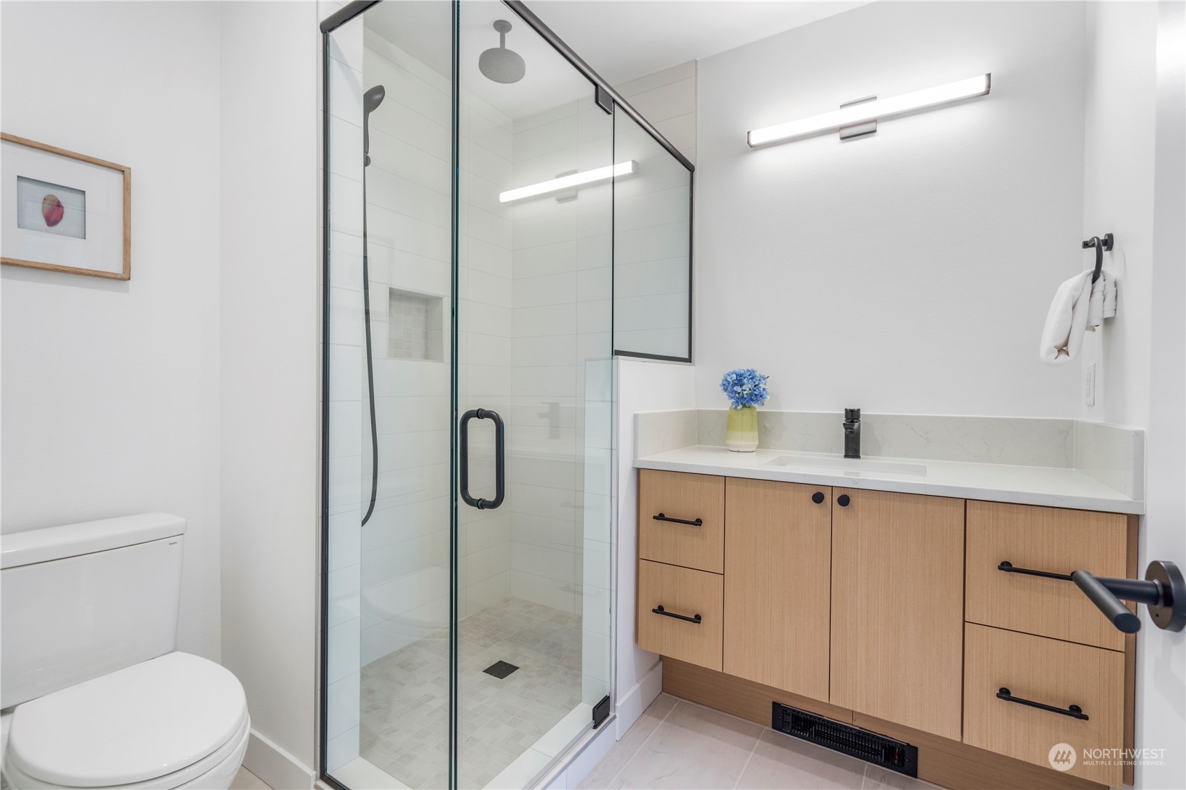 6014 B California Avenue Southwest Seattle, WA 98136 - Photo 19 of 27 a bathroom with a shower sink mirror and toilet