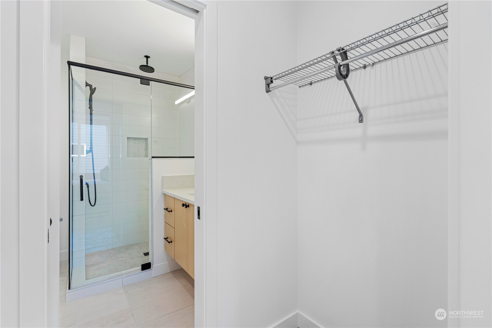 6014 B California Avenue Southwest Seattle, WA 98136 - Photo 21 of 27 a bathroom with a shower and a glass door