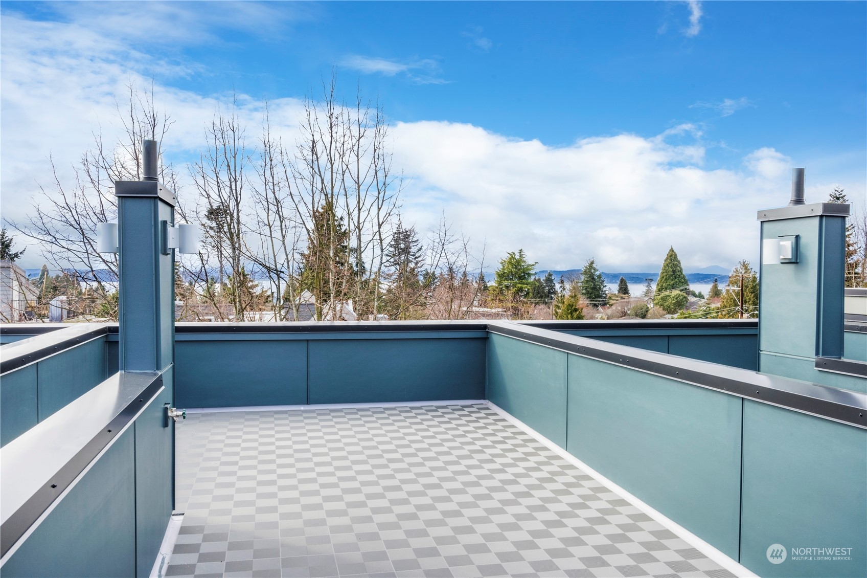 6014 B California Avenue Southwest Seattle, WA 98136 - Photo 22 of 27 a view of a balcony with an outdoor seating