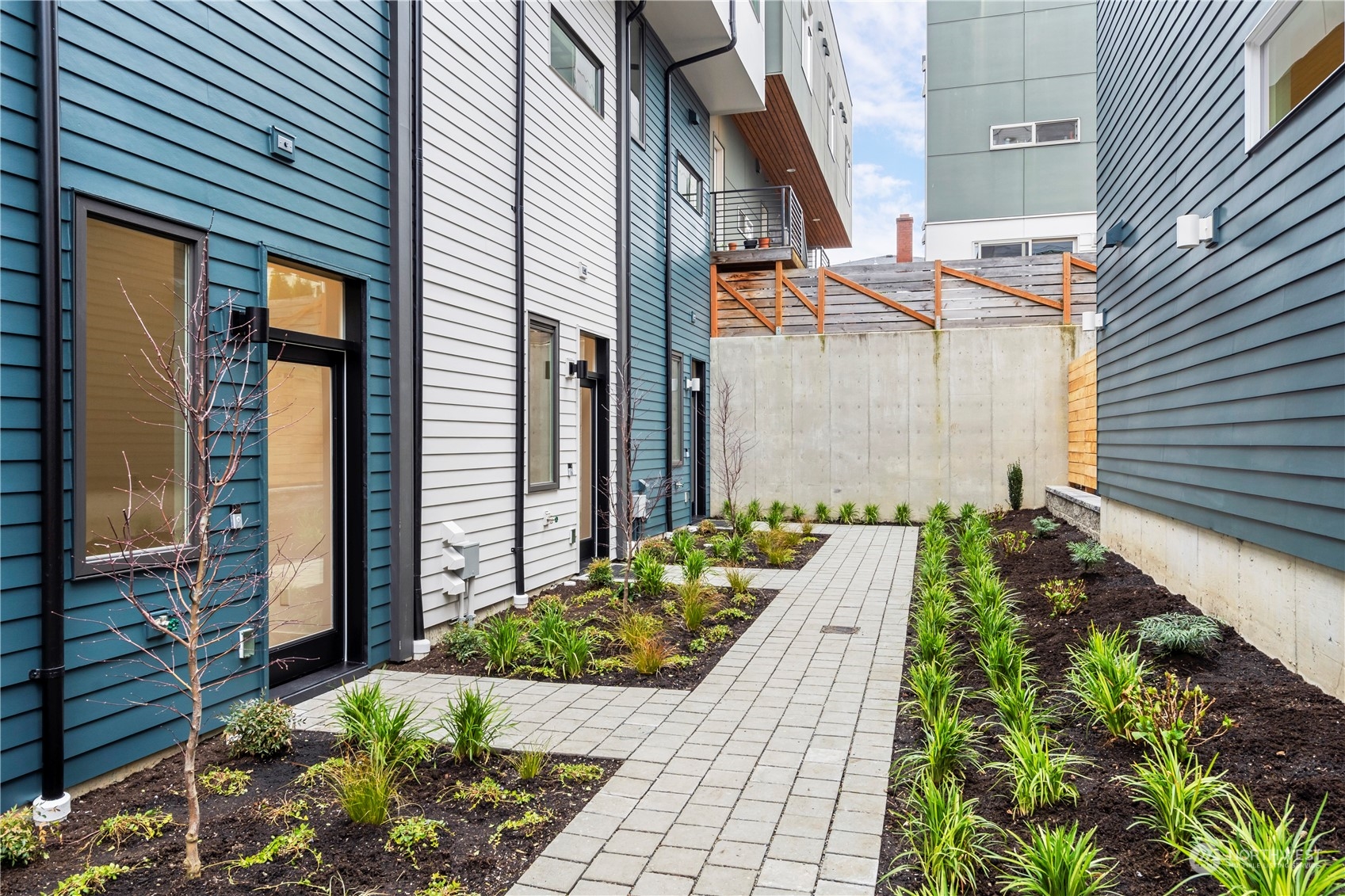 6014 B California Avenue Southwest Seattle, WA 98136 - Photo 24 of 27 a view of a back yard of the house