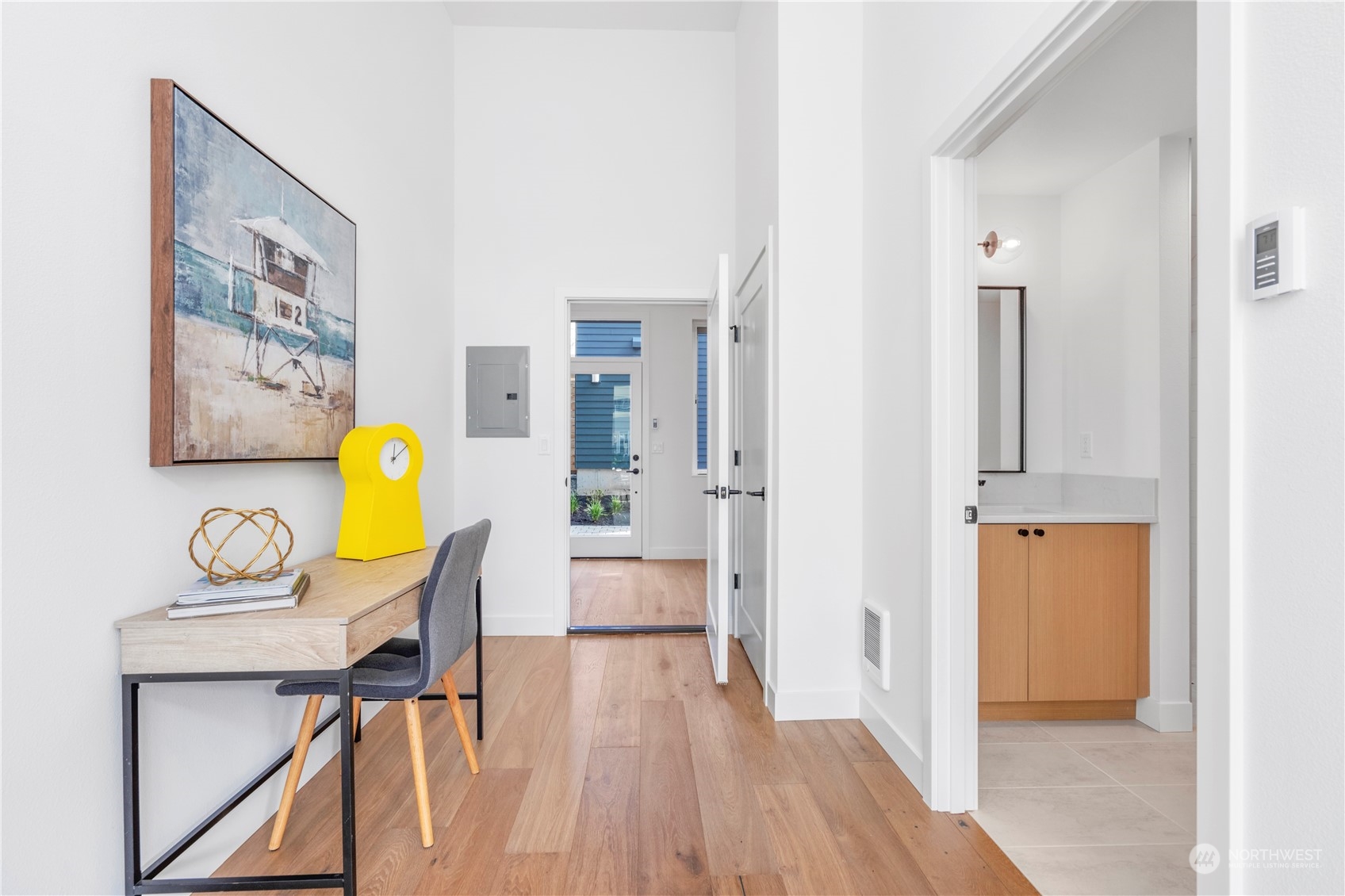 6014 B California Avenue Southwest Seattle, WA 98136 - Photo 7 of 27 a view of a dining room with furniture and wooden floor