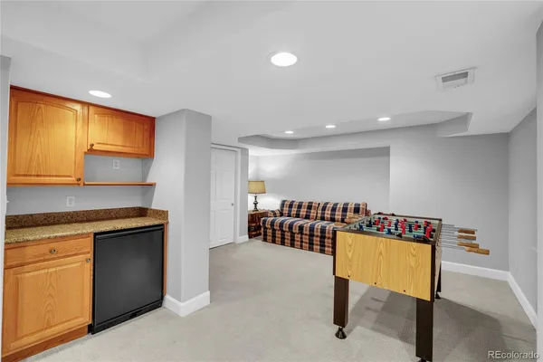 a living room with furniture and a couch