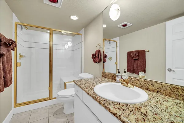 a bathroom with a sink a washer and dryer