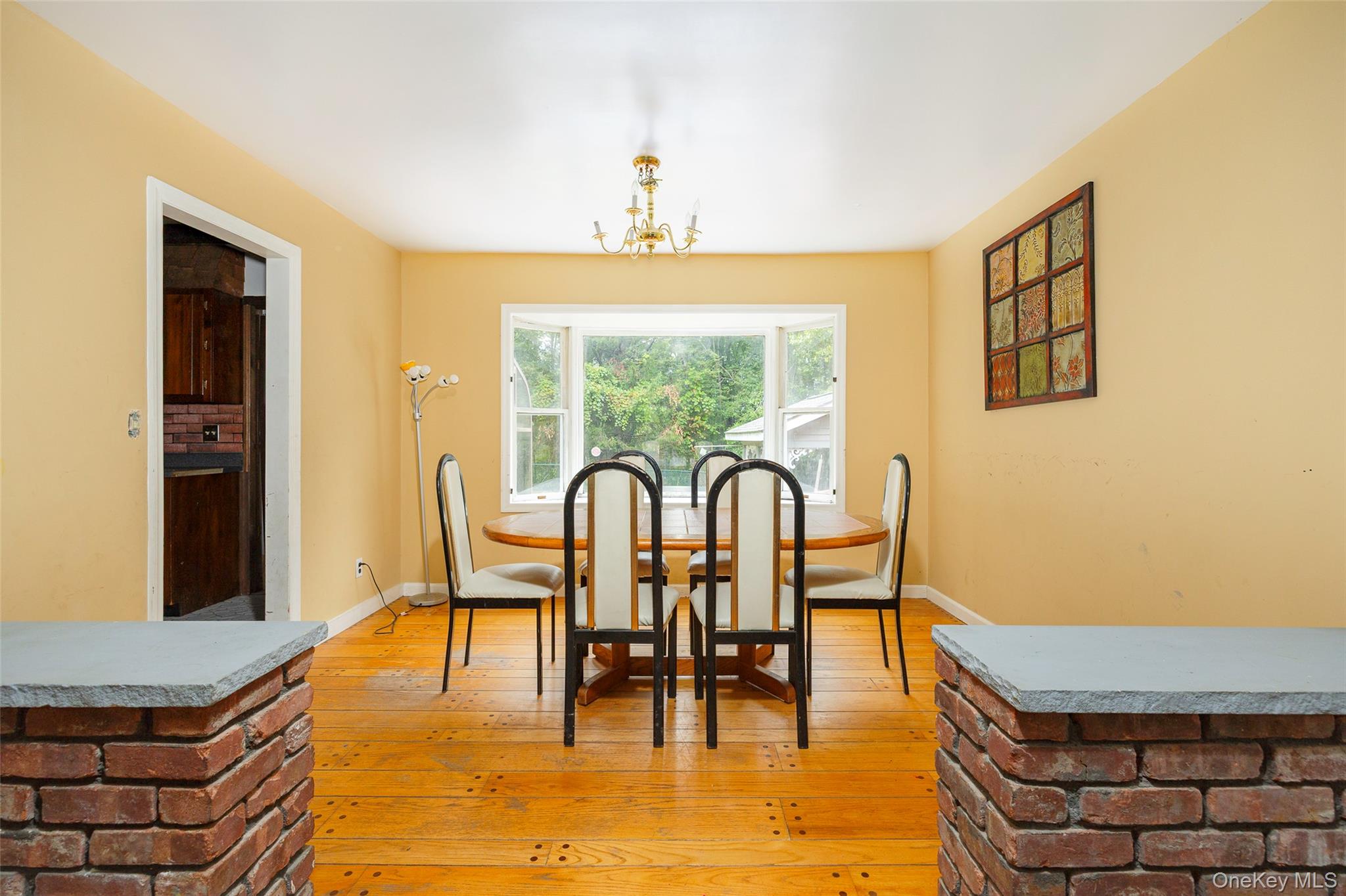 993 Highway 32 Wallkill, NY 12589 - Photo 23 of 35 Dining area with light wood-type flooring and a chandelier