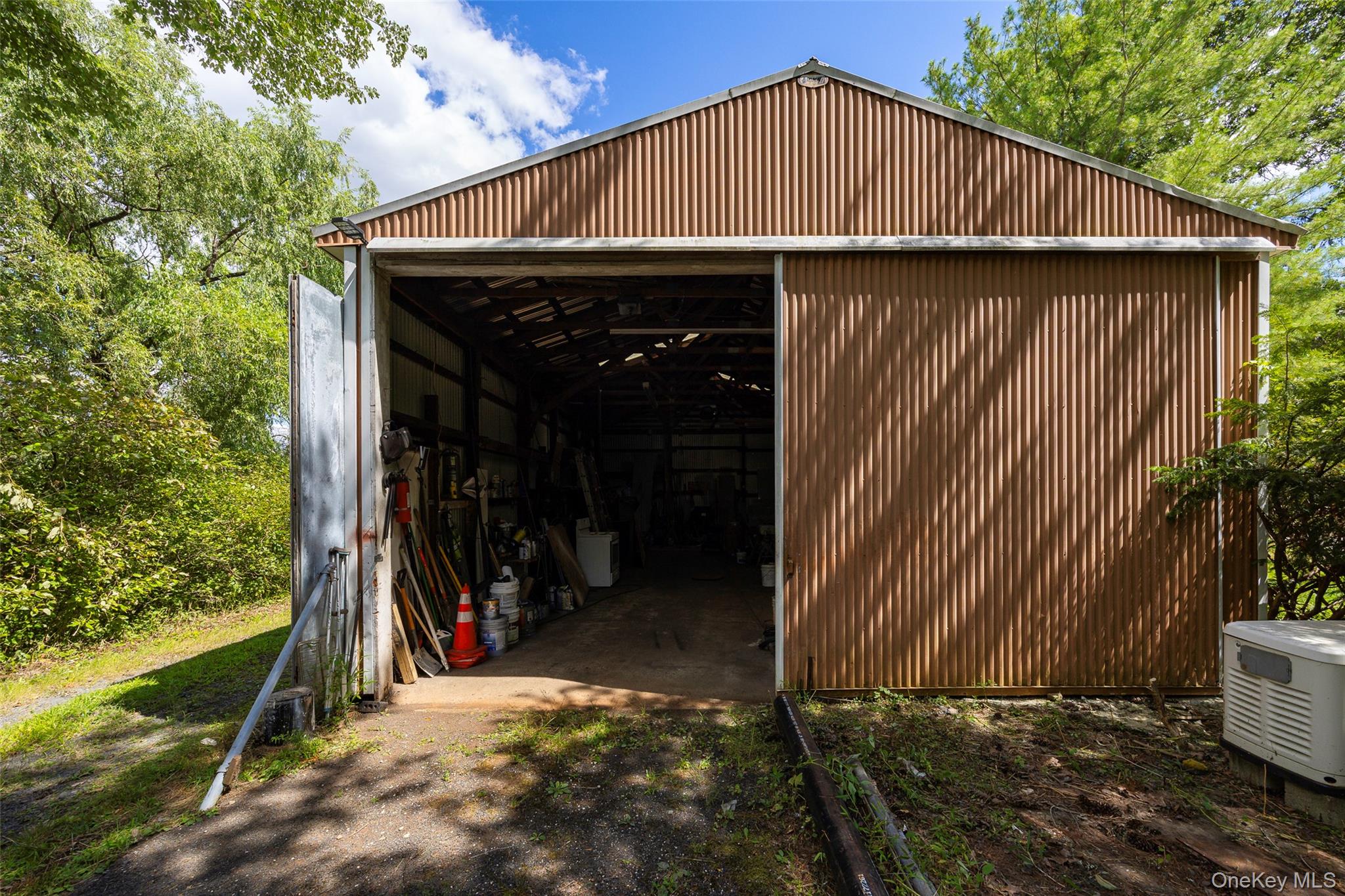 993 Highway 32 Wallkill, NY 12589 - Photo 6 of 35 View of pole building featuring a garage