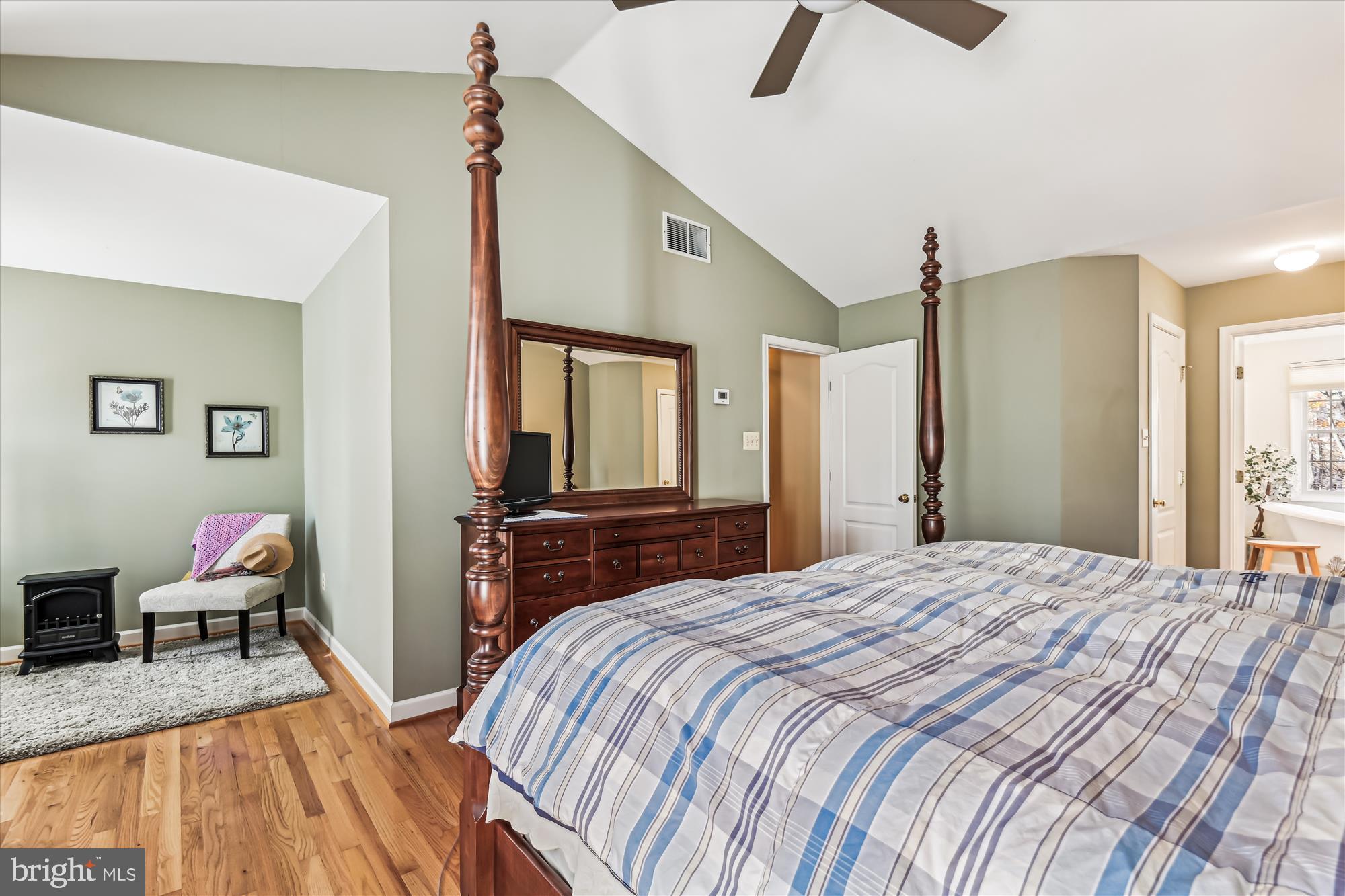 2620 Gunpowder Farms Road Fallston, MD 21047 - Photo 19 of 35 a bedroom with a bed and wooden floor