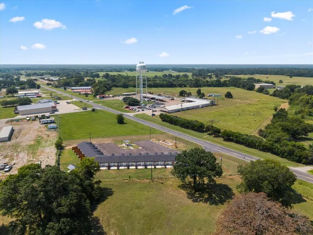 a view of a city with lawn chairs