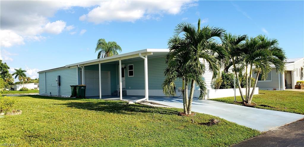 234 Eagle Road Naples, FL 34114 - Photo 1 of 1 a view of a house with a yard