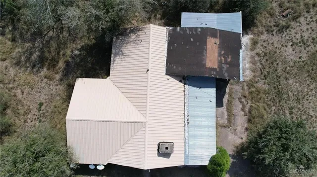 a picture of a bathroom with a shower