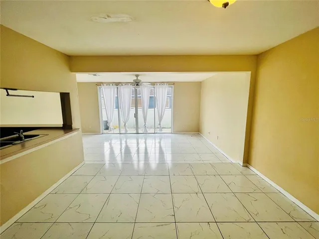 a view of a swimming pool and lounge chair