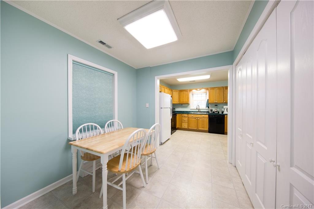 1610 Deer Run Road Catawba, SC 29704 - Photo 2 of 23 a kitchen with a table and chairs in it