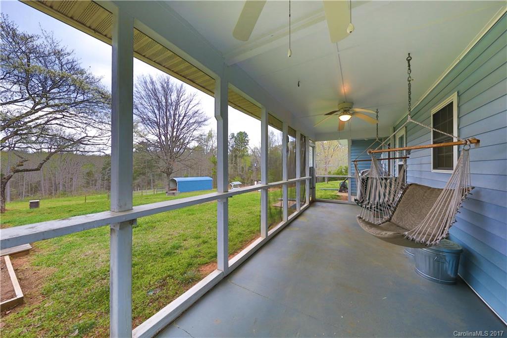 1610 Deer Run Road Catawba, SC 29704 - Photo 19 of 23 a view of balcony with floor to ceiling window and wooden fence