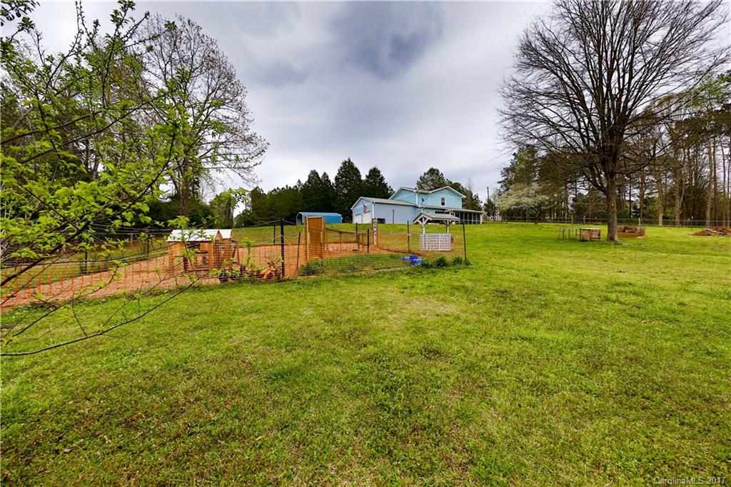 1610 Deer Run Road Catawba, SC 29704 - Photo 21 of 23 a view of a swimming pool with a yard