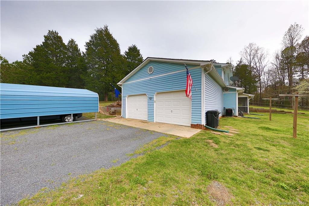 1610 Deer Run Road Catawba, SC 29704 - Photo 22 of 23 a house view with a garden space