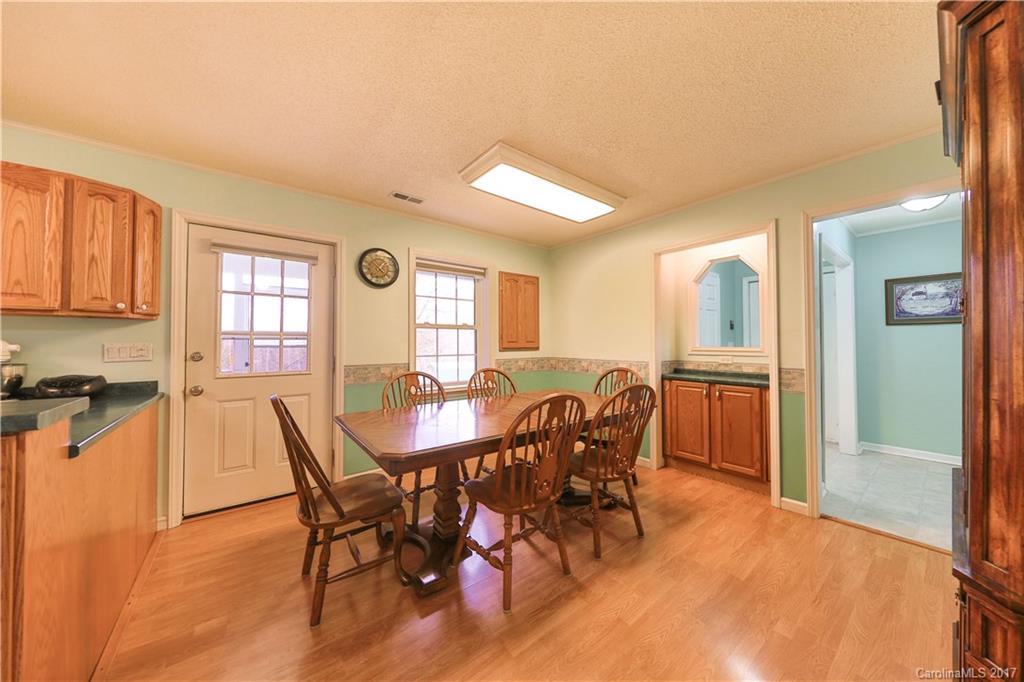 1610 Deer Run Road Catawba, SC 29704 - Photo 6 of 23 a view of a a dining room with furniture window and wooden floor