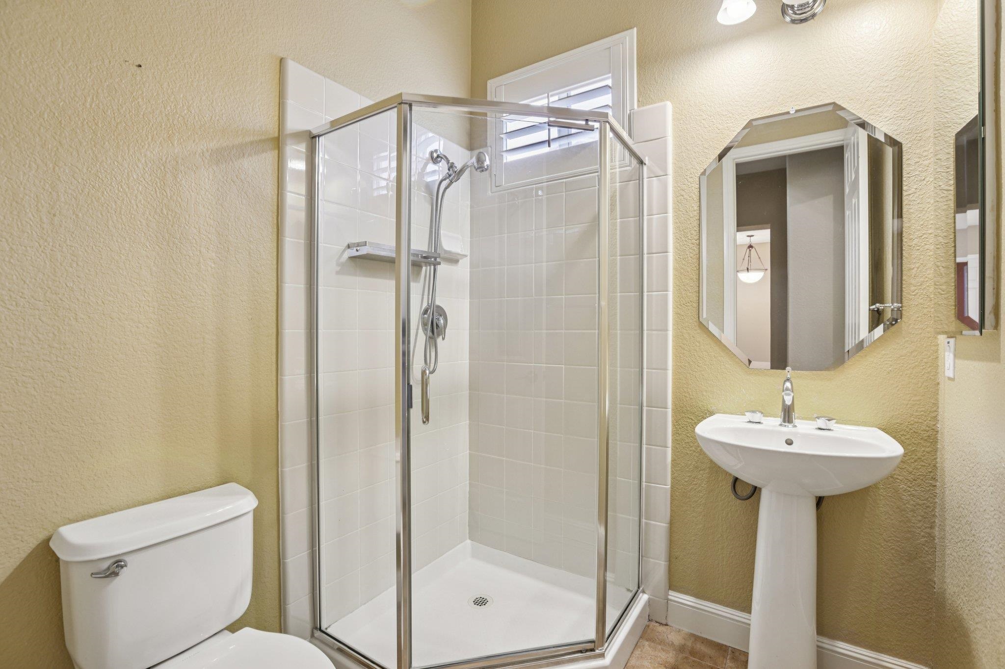 5227 Ramsdell Court Antioch, CA 94531 - Photo 20 of 58 Bathroom with a textured wall and a shower stall