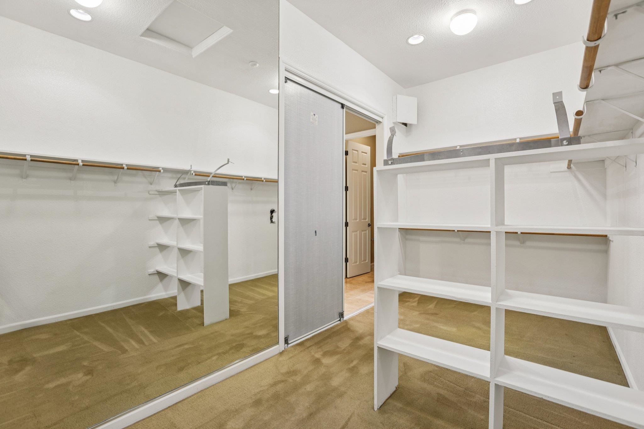 5227 Ramsdell Court Antioch, CA 94531 - Photo 44 of 58 Walk in closet with attic access and light carpet