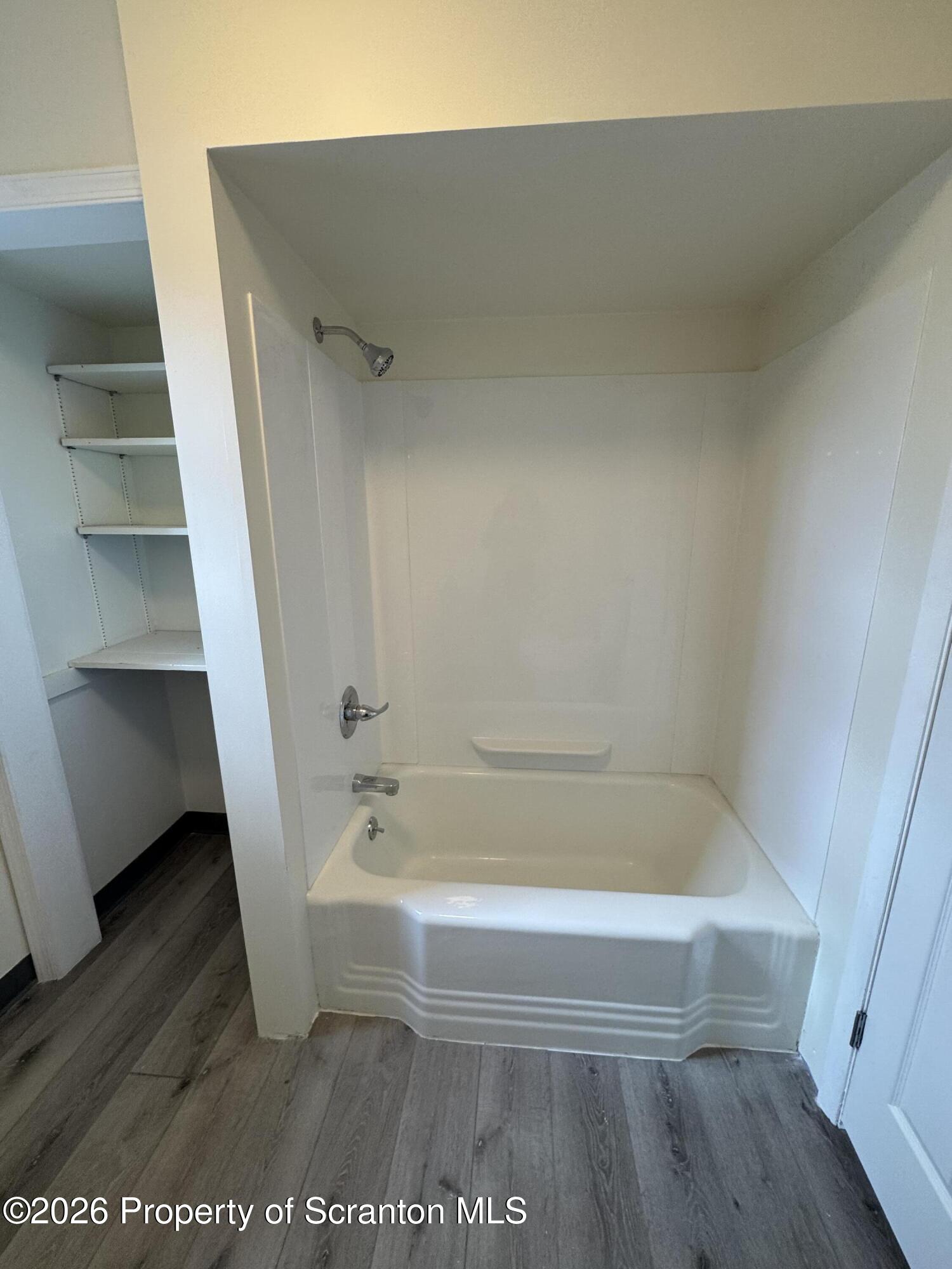 615 3rd Street, Unit 4 Dunmore, PA 18512 - Photo 8 of 17 a bathroom with a tub