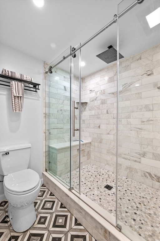 187 Echo Cove Road Hamilton, MA 01982 - Photo 32 of 42 a bathroom with a toilet and a shower