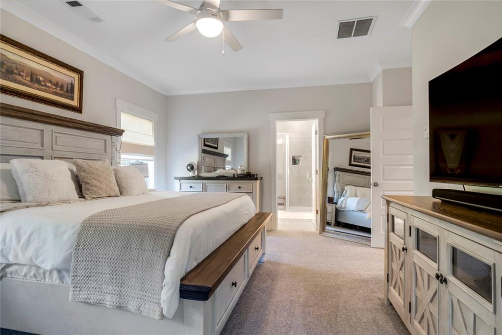 564 Old Airport Road Commerce, GA 30530 - Photo 25 of 39 a room with a bed and a television