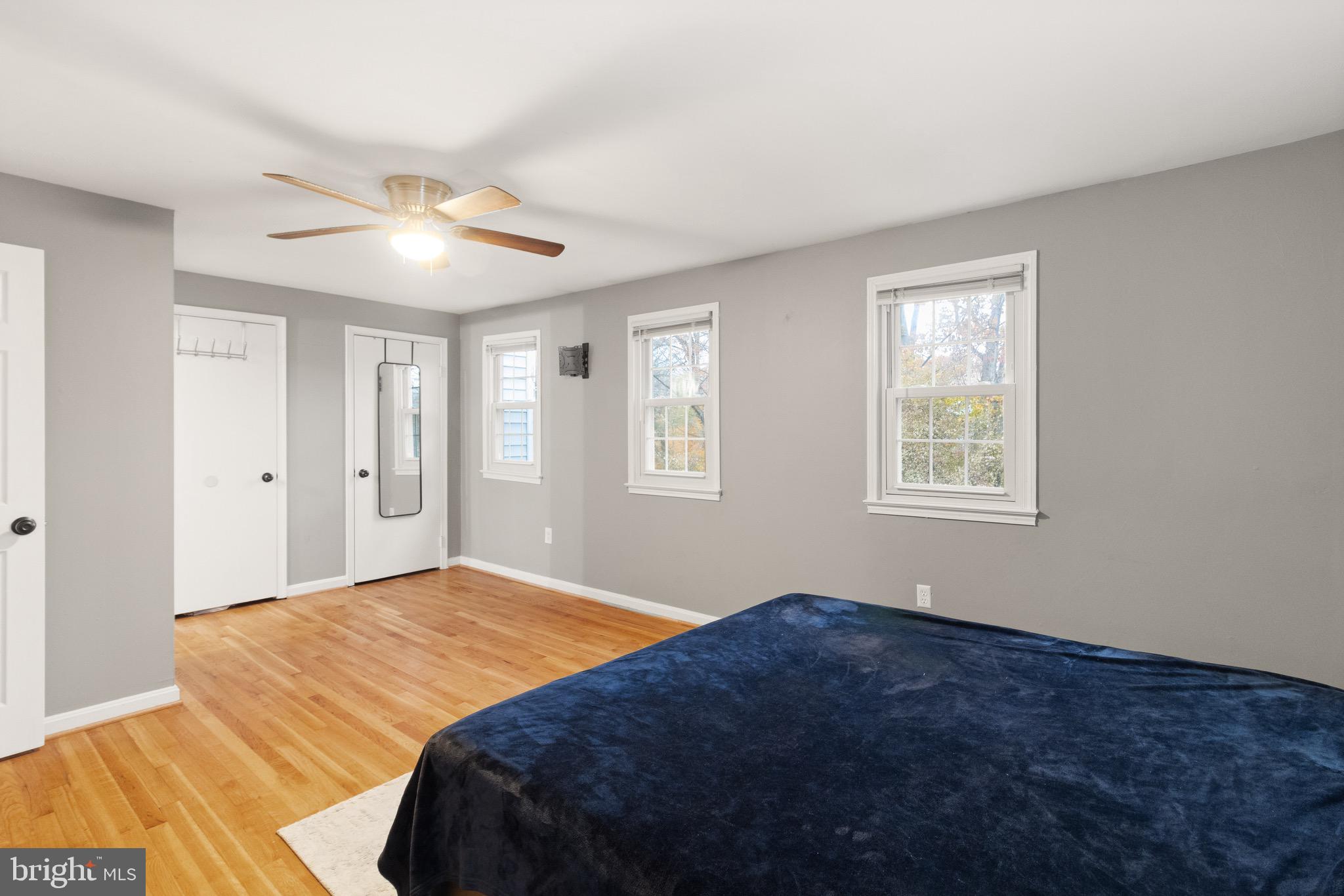 1315 Mead Terrace Woodbridge, VA 22191 - Photo 12 of 32 a bedroom with a large bed and a window