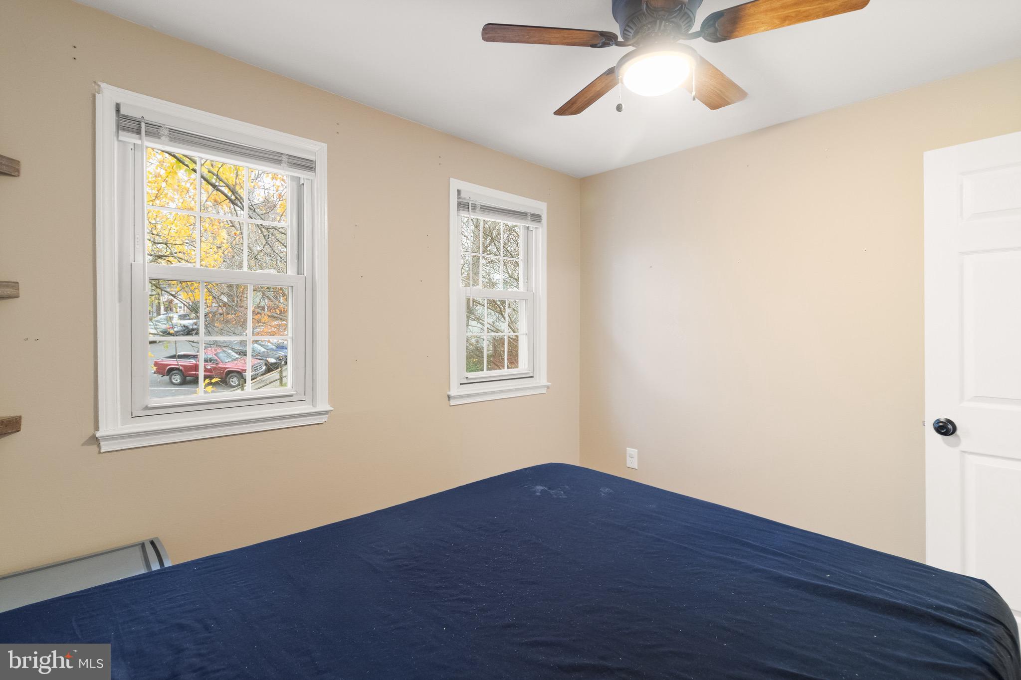 1315 Mead Terrace Woodbridge, VA 22191 - Photo 16 of 32 a view of an empty room with wooden floor and a window