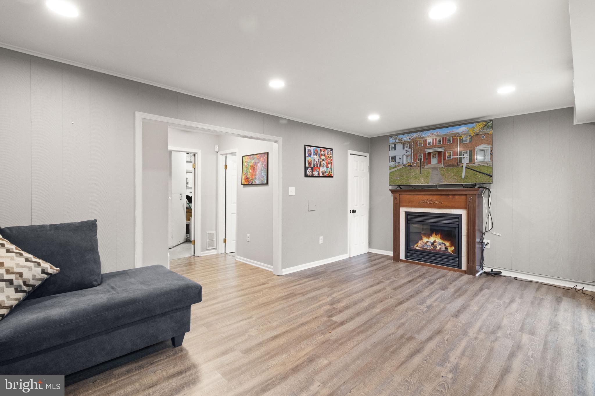 1315 Mead Terrace Woodbridge, VA 22191 - Photo 21 of 32 a living room with furniture and a fireplace