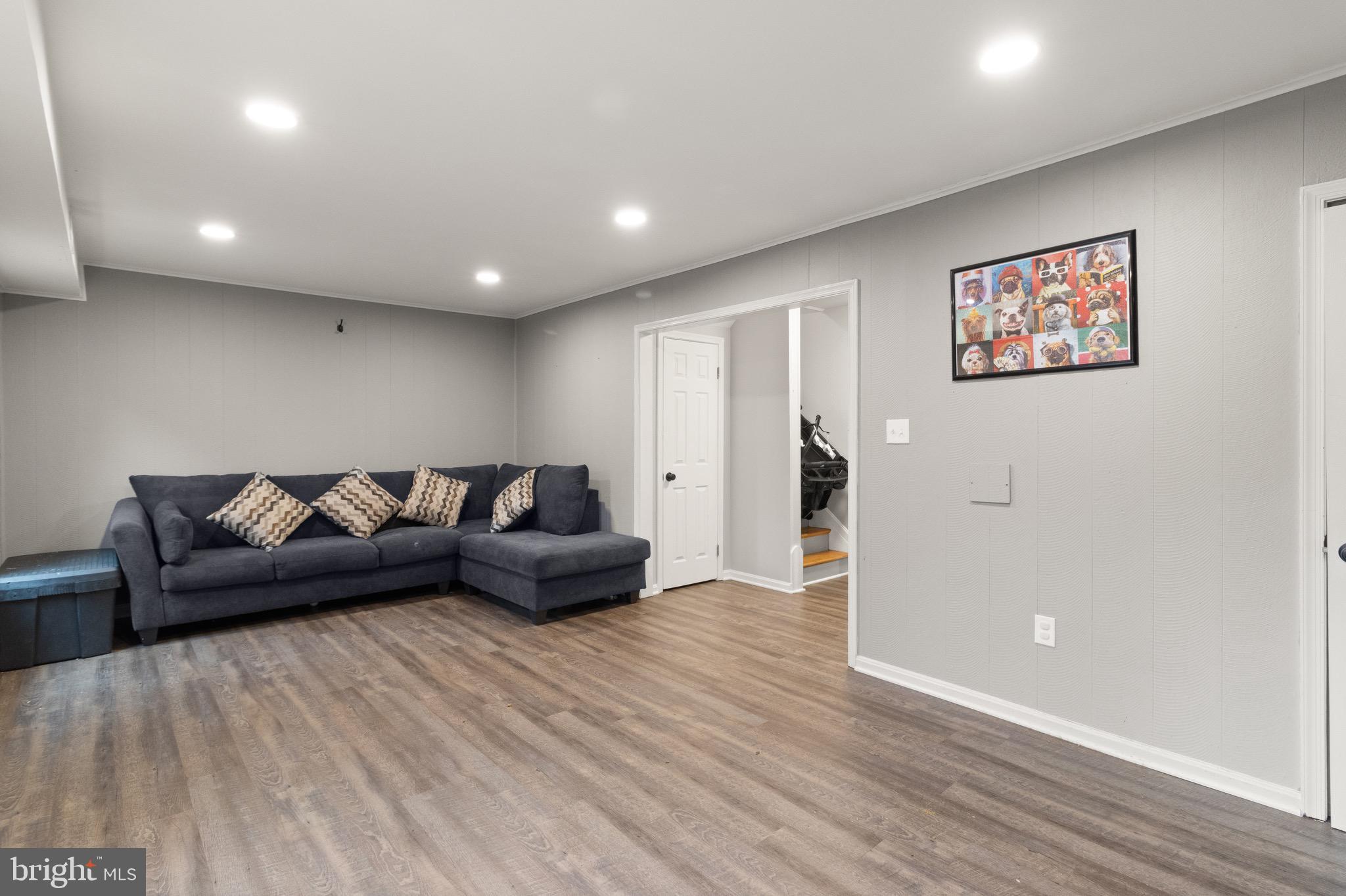 1315 Mead Terrace Woodbridge, VA 22191 - Photo 22 of 32 a living room with furniture and a wooden floor