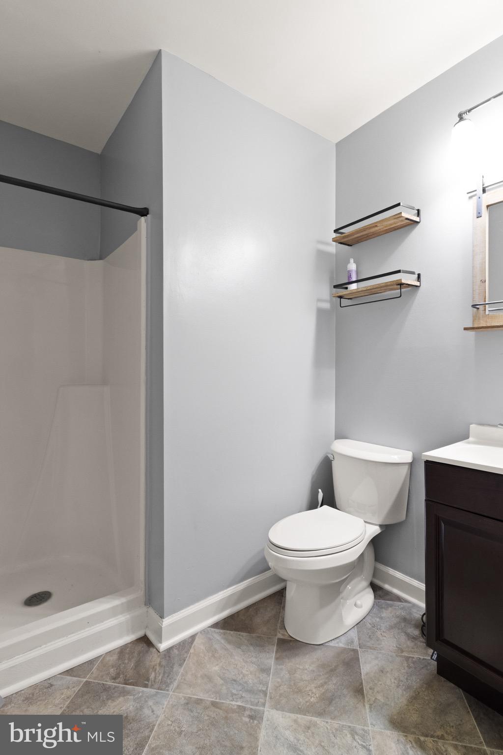 1315 Mead Terrace Woodbridge, VA 22191 - Photo 24 of 32 a bathroom with a toilet and a shower