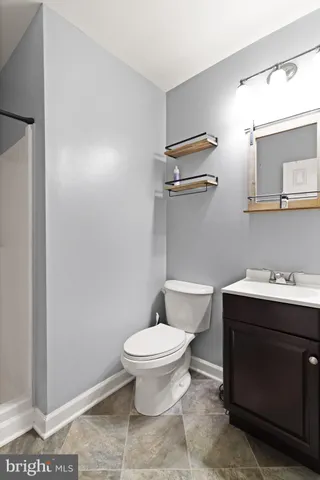 a bathroom with a sink and a toilet