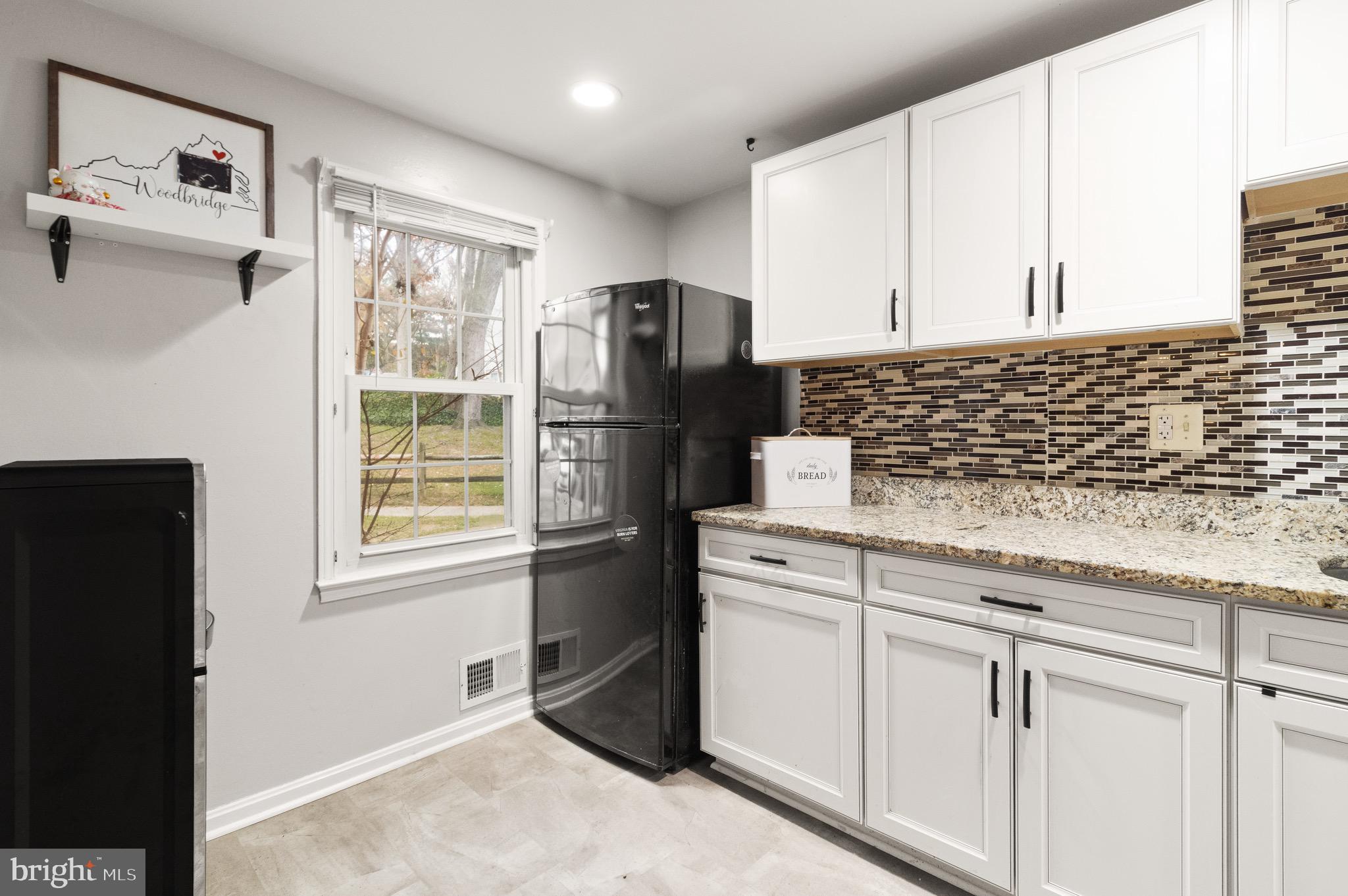 1315 Mead Terrace Woodbridge, VA 22191 - Photo 4 of 32 a kitchen with appliances cabinets and a window