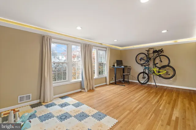 a view of a livingroom with furniture and a window