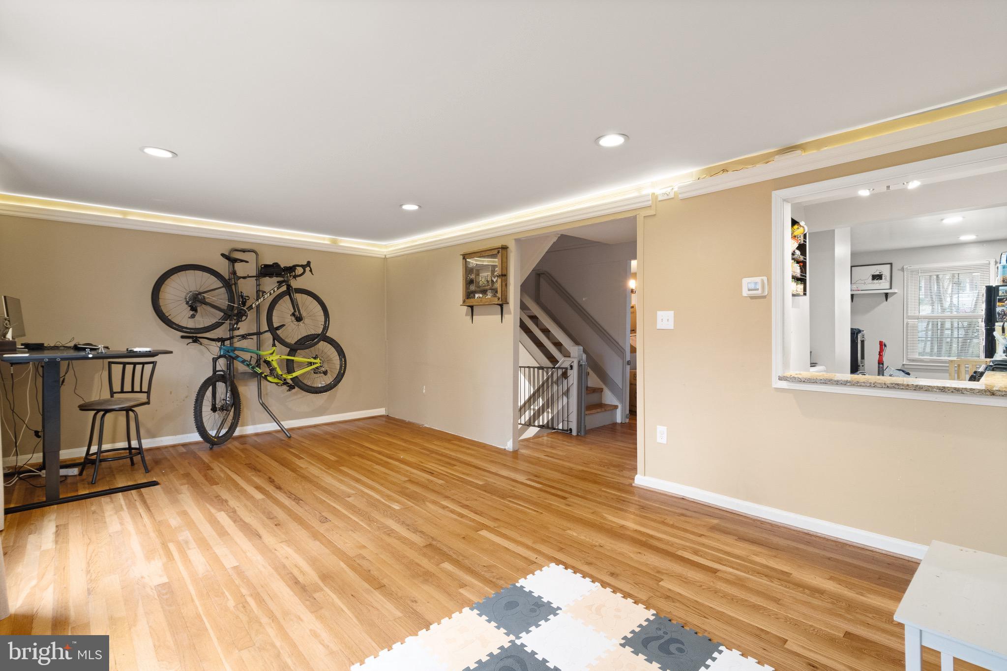 1315 Mead Terrace Woodbridge, VA 22191 - Photo 8 of 32 a view of a hallway with wooden floor