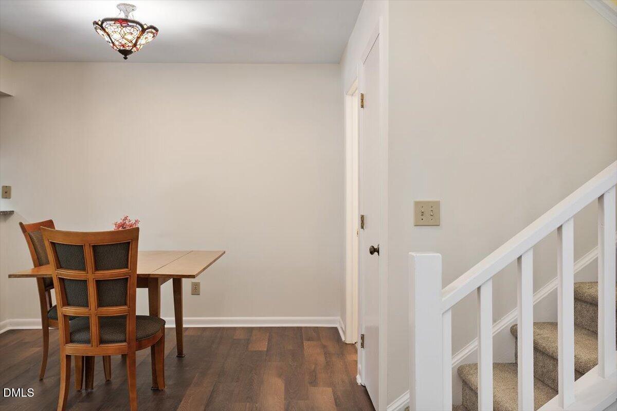 163 Springberry Lane Chapel Hill, NC 27517 - Photo 9 of 32 a view of a dining room with furniture