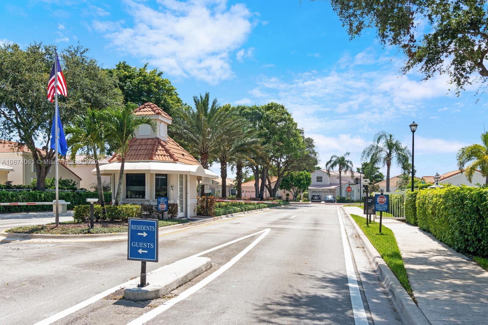 23434 Rakelle Circle Boca Raton, FL 33433 - Photo 36 of 40 a front view of a building with street view