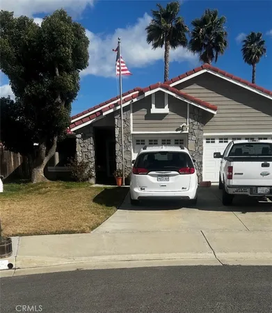 a car parked in front of a house