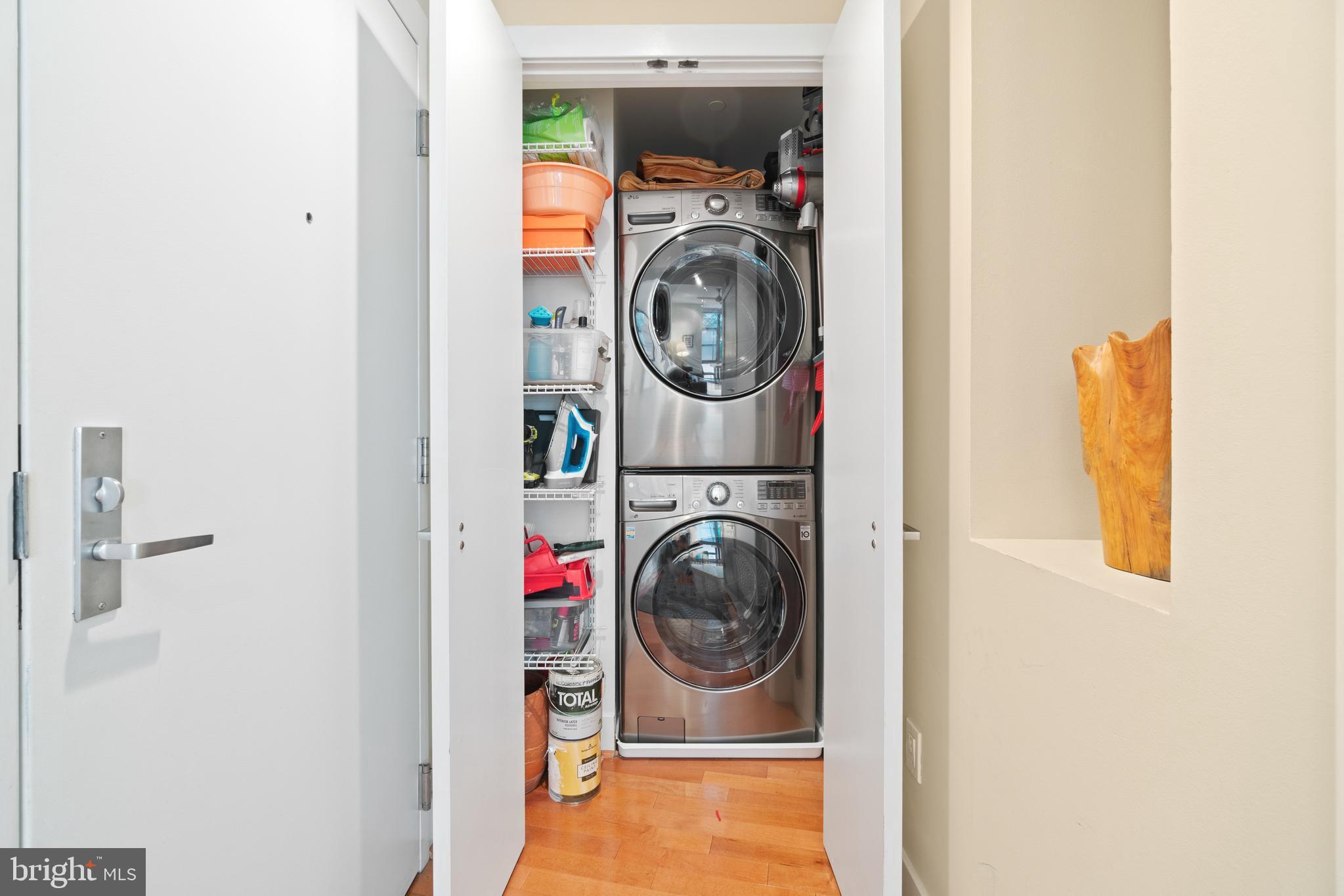2426 Ontario Road Northwest, Unit 201 Washington, DC 20009 - Photo 13 of 19 a utility room with dryer and washer