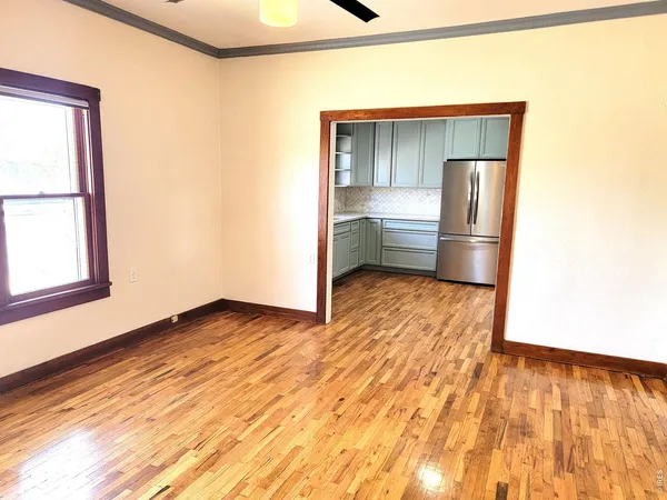 a bathroom with a sink and a window