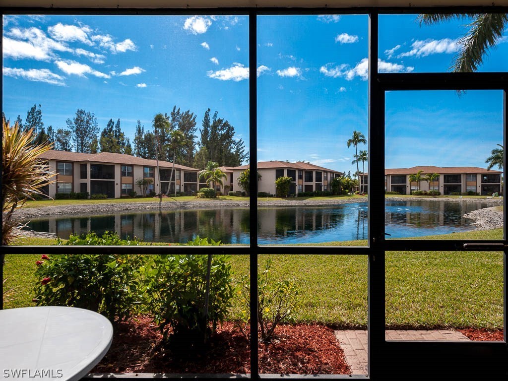 16881 Davis Road, Unit 414 Fort Myers, FL 33908 - Photo 2 of 24 a view of swimming pool from a balcony