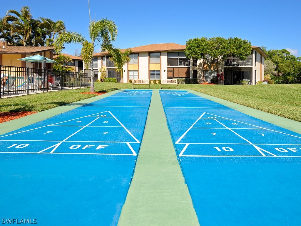 16881 Davis Road, Unit 414 Fort Myers, FL 33908 - Photo 22 of 24 a view of a basketball court