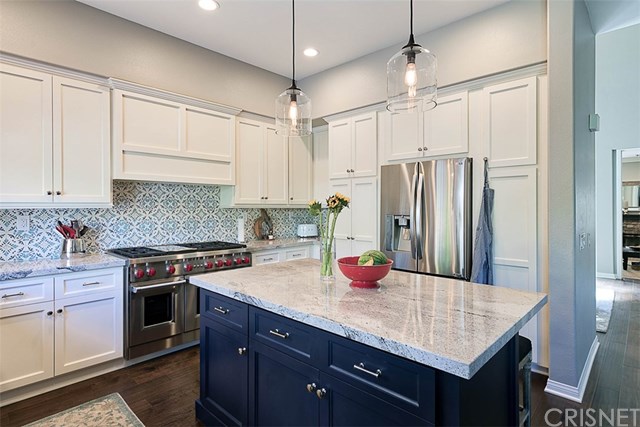 25907 Franklin Lane Stevenson Ranch, CA 91381 - Photo 16 of 58 High ceilings with recessed lighting and custon center island cabinetry