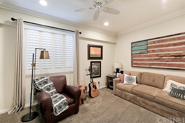 25907 Franklin Lane Stevenson Ranch, CA 91381 - Photo 21 of 58 Downstairs bedroom with fan and shutters