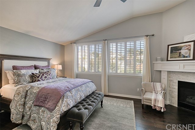 25907 Franklin Lane Stevenson Ranch, CA 91381 - Photo 25 of 58 Step up Master Suite with vaulted ceiling, shutters and gorgeous refinished fireplace and hardwood floors
