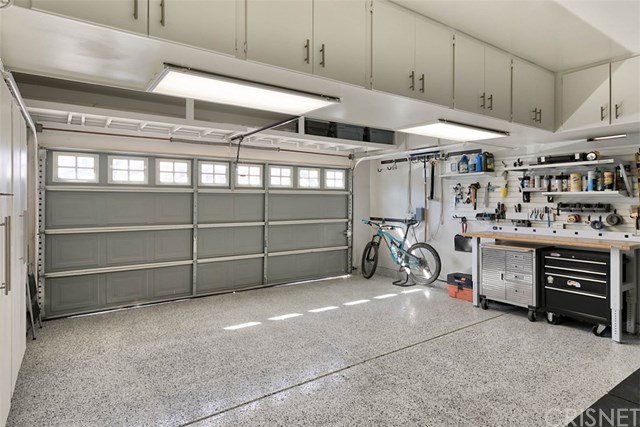 25907 Franklin Lane Stevenson Ranch, CA 91381 - Photo 36 of 58 Epoxy floors in garage and built in cabinetry