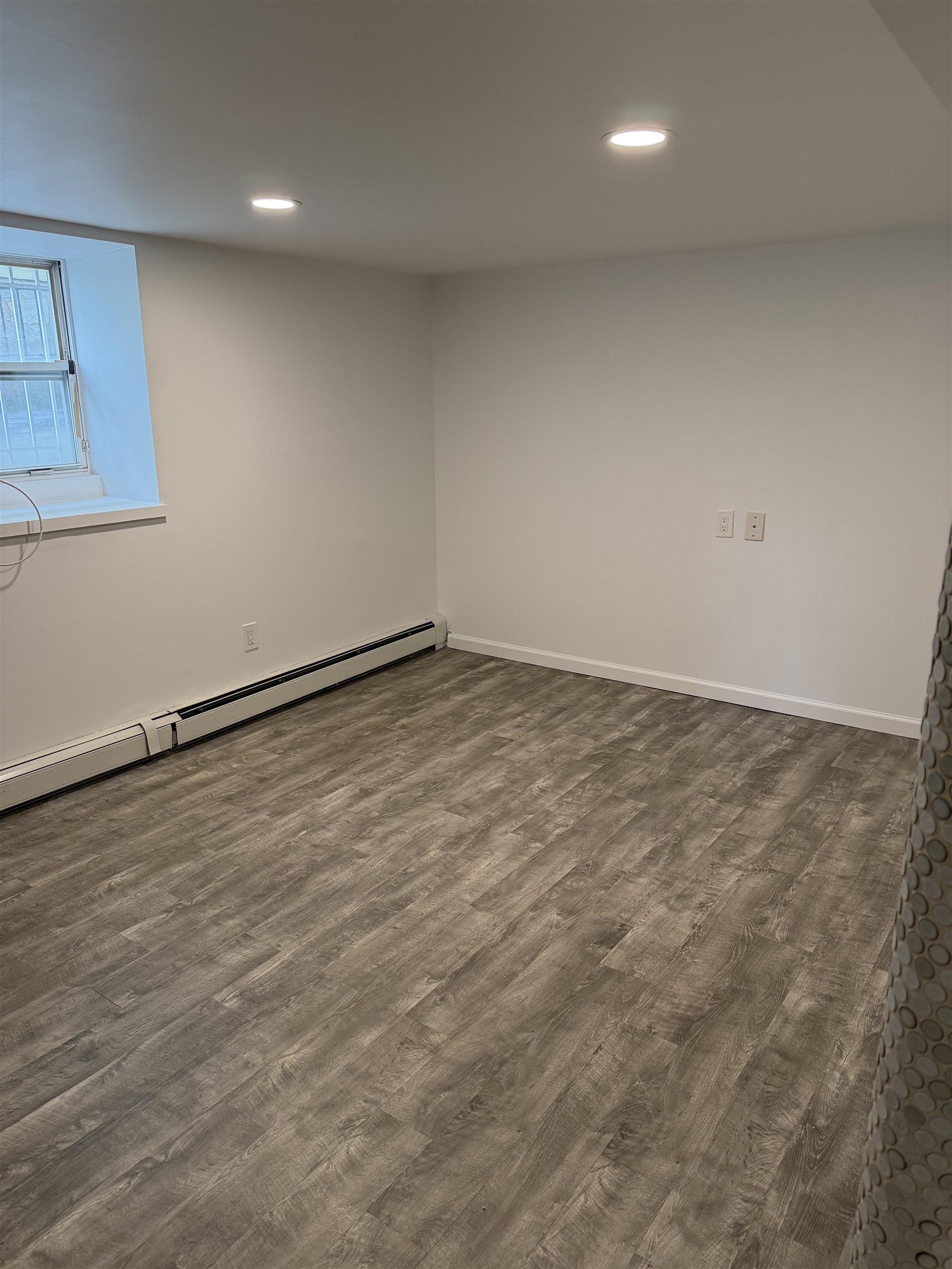 290 Paterson Plank Road, Unit 1 Jersey City, NJ 07307 - Photo 14 of 17 an empty room with an entryway