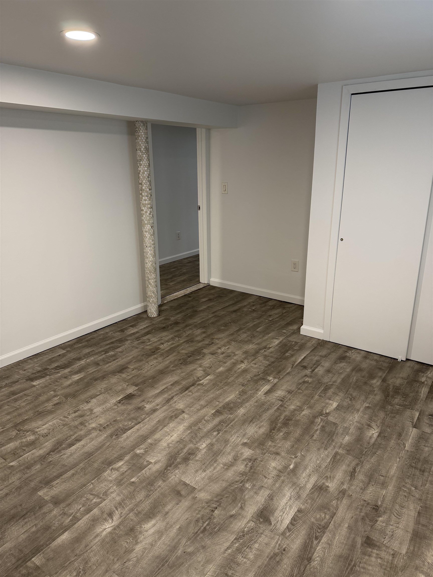 290 Paterson Plank Road, Unit 1 Jersey City, NJ 07307 - Photo 16 of 17 a view of an empty room and window