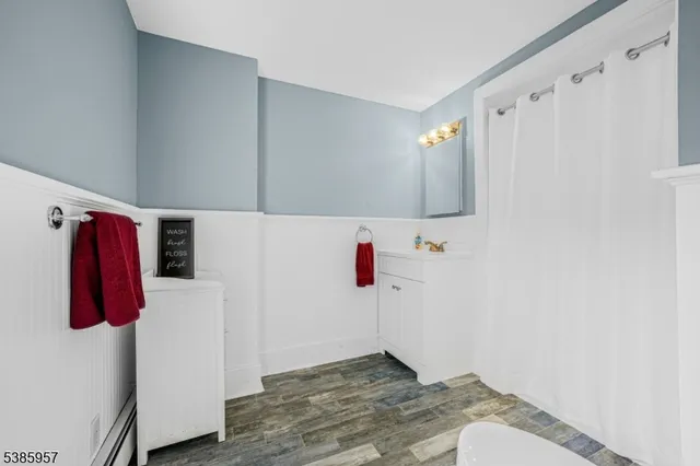 a living room with a couch and a flat screen tv