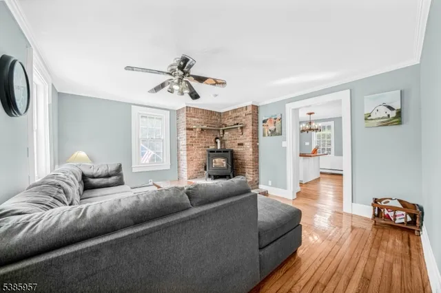 a workspace with furniture hardwood and a window